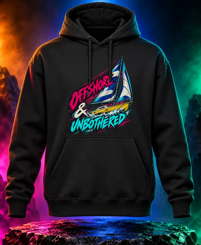 Offshore & Unbothered hoodie with a cobalt-and-ivory sailing yacht, yellow hull and Offshore & Unbothered brush lettering. Black option. Digital mockup.