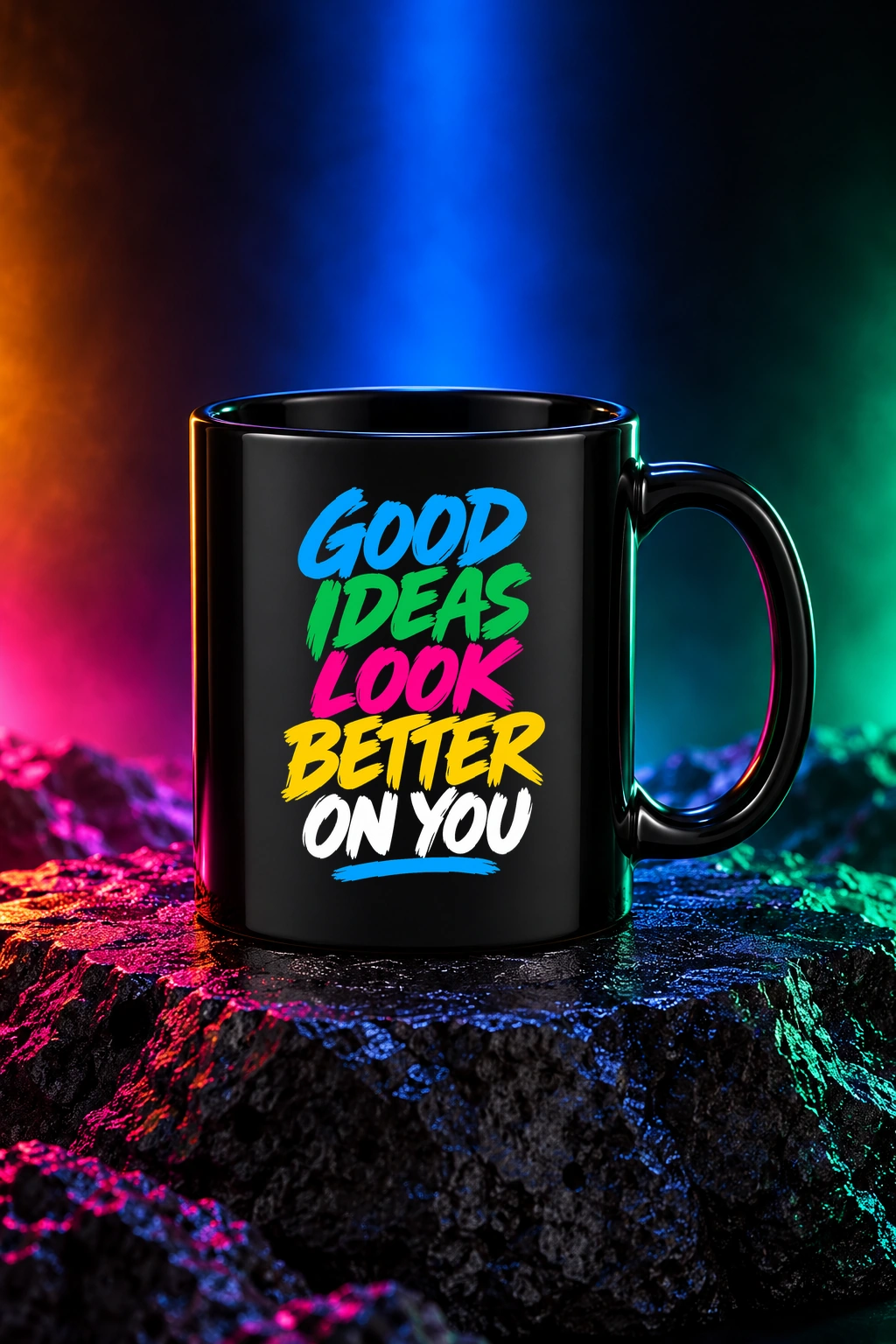 Black mug with the Good Ideas artwork. Expressive rainbow brush lettering gives Good Ideas its bold, optimistic personality. Digital studio mockup.
