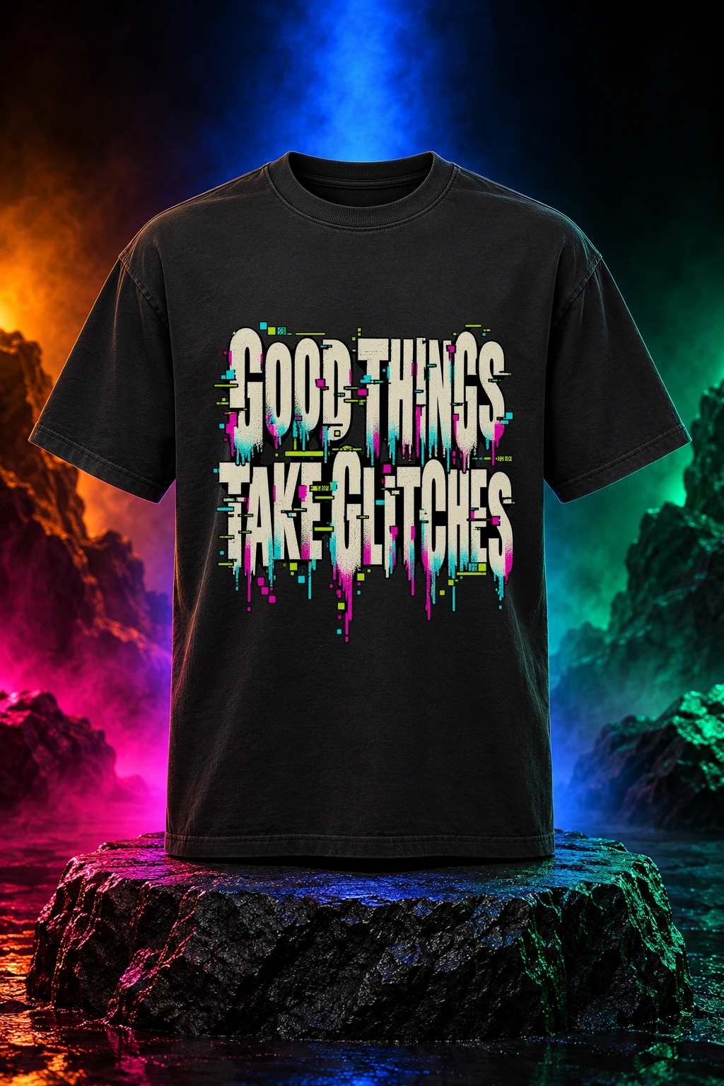 Black tee with the Good Things Take Glitches artwork. Fractured lettering and colorful digital details give Good Things Take Glitches its optimistic retro-tech humor. Digital studio mockup.