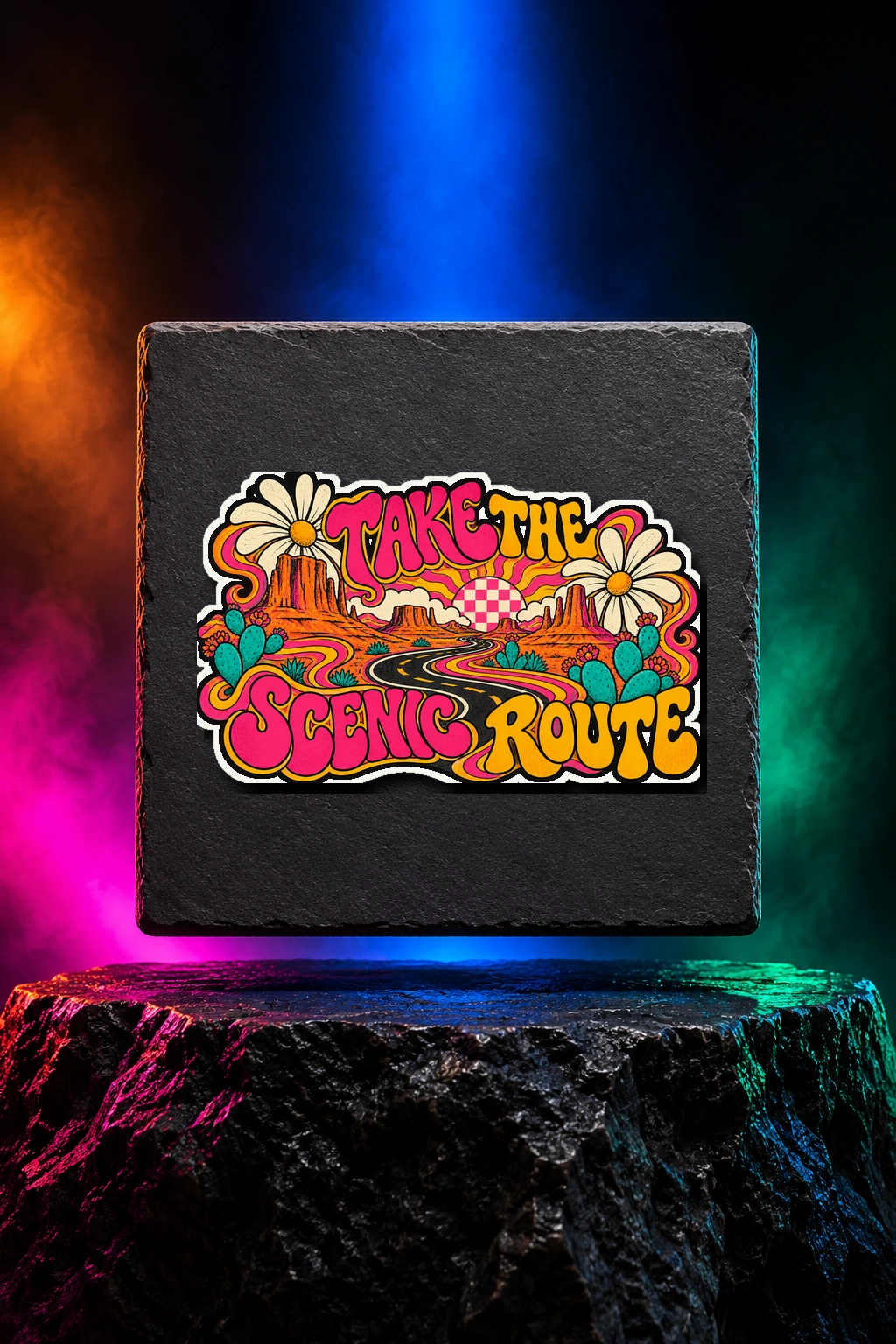 White kiss-cut sticker with the Take the Scenic Route artwork. Winding desert roads, bright cacti and psychedelic color make Take the Scenic Route a road trip worth wearing. Digital studio mockup.